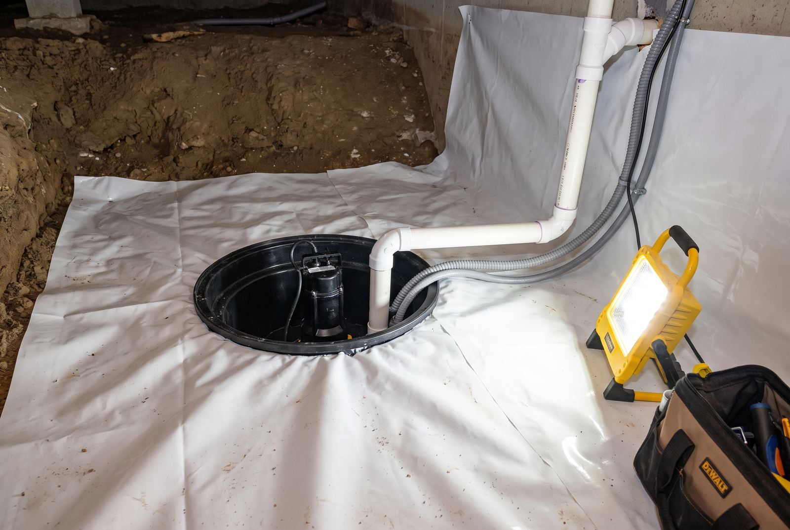 Sump pump installed in a sealed crawl space